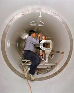 Amit Lath in the large vacuum  chamber at the KTeV  Experiment